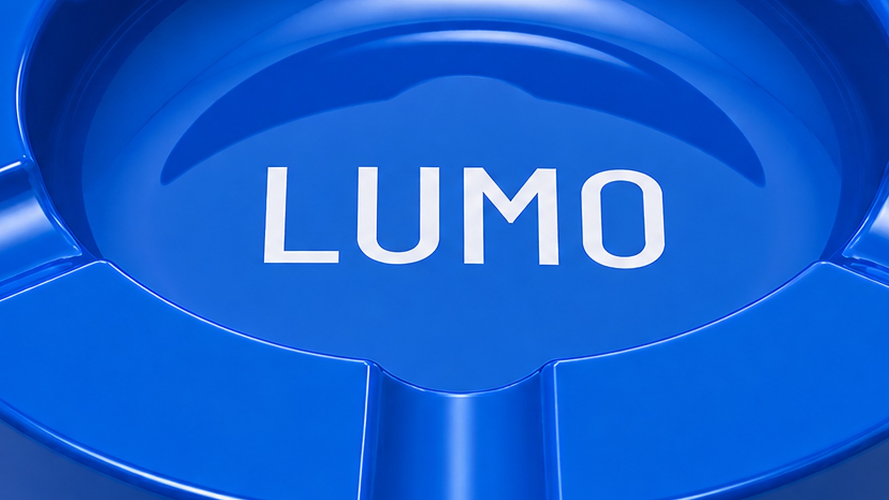 Macro detail of the glossy blue ashtray surface